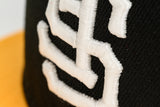NEW ERA "MYSTERY" SAN FRANCISCO GIANTS  FITTED HAT (BLACK/A GOLD/SCARLET)