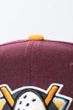 NEW ERA "KNUCKLE PUCK" ANAHEIM DUCKS FITTED HAT (MAROON/TEAL/GOLD)