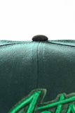 NEW ERA "JET LIFE" WINNEPEG JETS FITTED HAT (DARK GREEN/CILANTRO GREEN/BLACK
