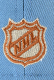 NEW ERA "CASEY JONES" ANAHEIM DUCKS FITTED HAT (FADED BLUE/EARTH BROWN)