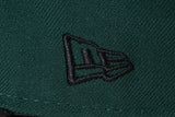 NEW ERA "TEAM SPLIT” OAKLAND A'S FITTED HAT (DARK GREEN/BLACK)