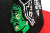 NEW ERA "MUTA" CHICAGO BLACKHAWKS FITTED HAT (BLACK/RED)