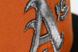 NEW ERA "GETTIN IT” OAKLAND ATHLETICS FITTED HAT (BURNT ORANGE/BLACK/CHROME)