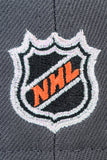 NEW ERA "BAY WATERS” SAN JOSE SHARKS FITTED HAT (DARK GRAPHITE/ORANGE)