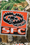 SFC X NEW ERA "TRAP'N" 9FORTY A-FRAME SNAPBACK (REAL TREE CAMO / ORANGE)