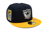 NEW ERA “MEMORIAL STADIUM” LAS VEGAS RAIDERS FITTED HAT (NAVY/A GOLD/GREY)