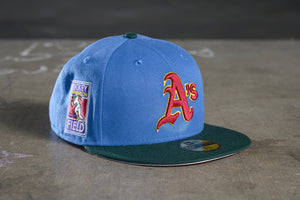 NEW ERA "FUN HOUSE" OAKLAND A'S FITTED HAT (INDIGO BLUE)