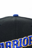 NEW ERA "RUN TMC" GOLDEN STATE WARRIORS FITTED HAT (BLACK/ DARK ROYAL)