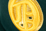 NEW ERA "U OF OAKLAND" OAKLAND OAKS FITTED HAT (DARK GREEN/YELLOW)