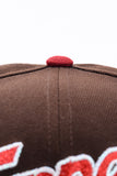 NEW ERA "BACK IN THE WOODS" EDMONTON TRAPPERS FITTED HAT (BROWN)