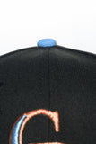 NEW ERA "ICE ROAD" COLORADO ROCKIES FITTED HAT (BLACK/ SONGBIRD BLUE)