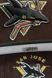 NEW ERA "OUT THE MUD” SAN JOSE SHARKS  FITTED HAT (BURNT WOOD / BLACK/ RIFLE GREEN)