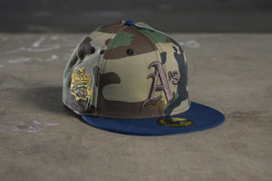 NEW ERA “CAMO" OAKLAND ATHLETICS FITTED HAT (WOODLAND/OCEANSIDE BLUE)