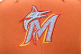 NEW ERA "BENJAMINS” FLORIDA MARLINS FITTED HAT (BURNT ORANGE/BLACK)