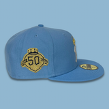 NEW ERA "10 POUNDS OF GOLD" KANSAS CITY ROYALS FITTED HAT (SKY BLUE/SONGBIRD BLUE)